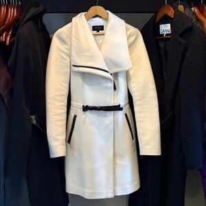 Mackage off white jacket with black leather details. Only worn a few times